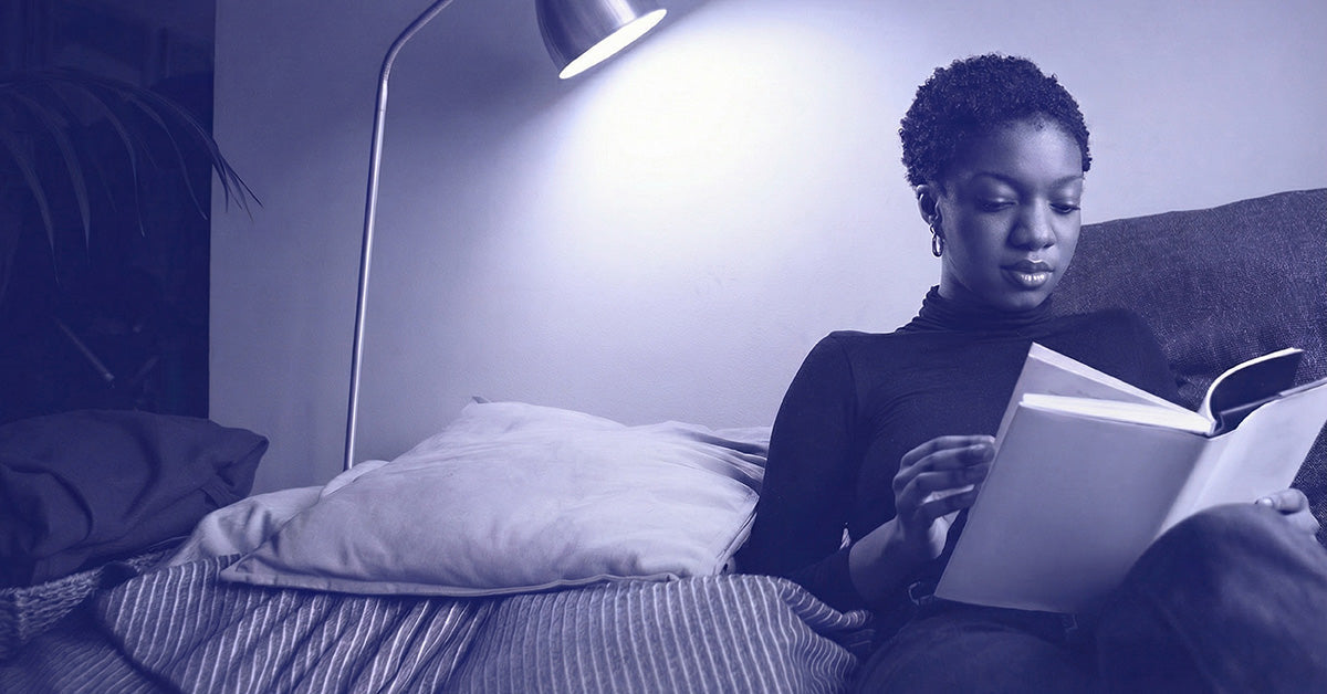 Woman reading book CBG