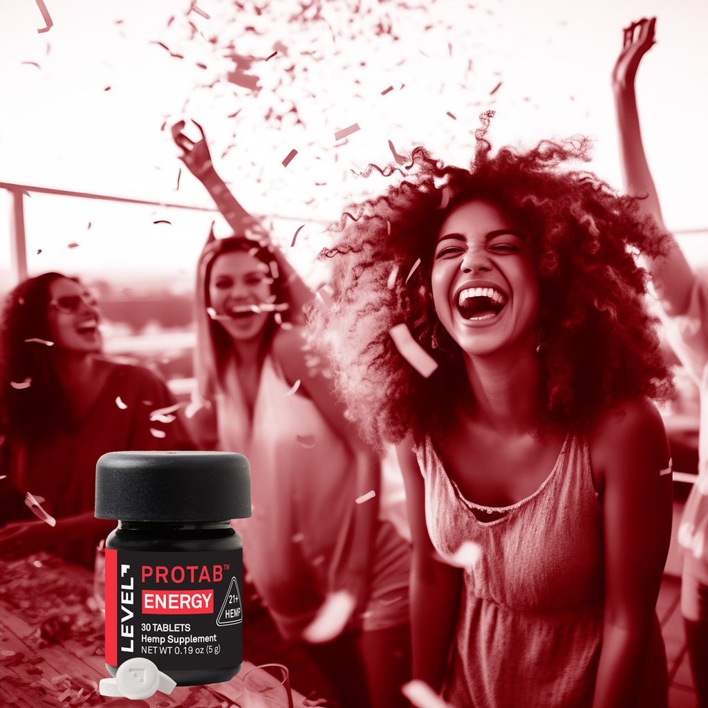 Protab Energy supplement bottle with a woman celebrating in the background